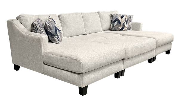 Seccional de 3 piezas en color beige y azul marino con otomana