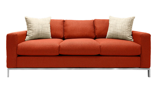 Sofá Mandarina con cojines decorativos