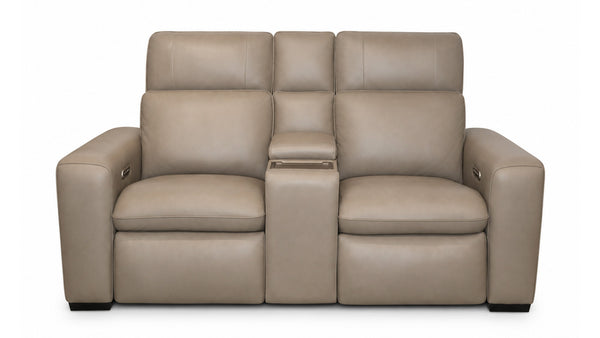 Beige leather reclining sofa on a white background
