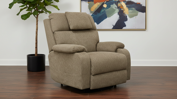 Sillón reclinable marrón en una habitación con una planta y arte abstracto en la pared.