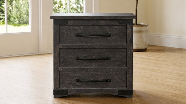 Dark wooden nightstand with three drawers on a wooden floor.