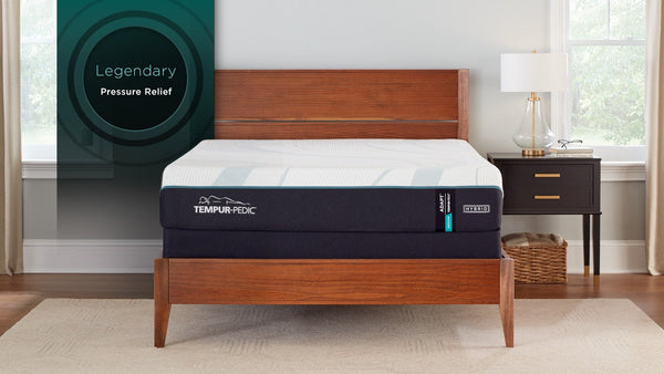 "Vista lateral del Colchón TEMPUR-Adapt® 2.0 Híbrido Medio mostrando su perfil de 12 pulgadas y su construcción híbrida de soporte de espuma y espiral"