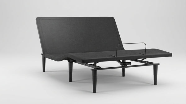 Full Sealy Ease 4.0 Adjustable Bed Base shown in a room setting with a full-size mattress foundation, adjustable legs, and a wireless remote control visible.
