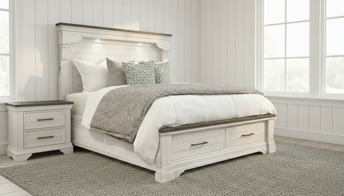 Bedroom with a wooden bed and matching nightstands in a well-lit room.