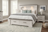 High Plains Queen Storage Bed styled in master bedroom with matching nightstands and reading lights