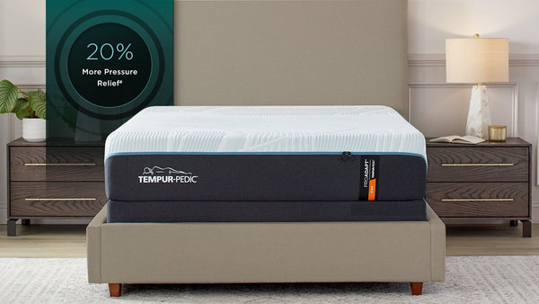 "Vista lateral del Colchón Firme TEMPUR-ProAdapt 2.0 mostrando su perfil de 12 pulgadas y su firme estructura de soporte"