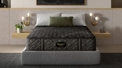 Mattress on a bed in a modern bedroom with decor elements.