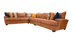 Brown sectional sofa with colorful pillows on a white background