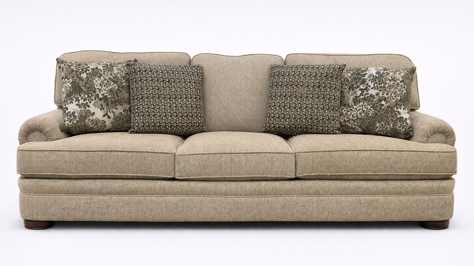 Beige sofa with patterned cushions on a white background