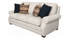 Beige sofa with decorative pillows on a white background