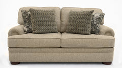 Beige sofa with patterned cushions on a white background