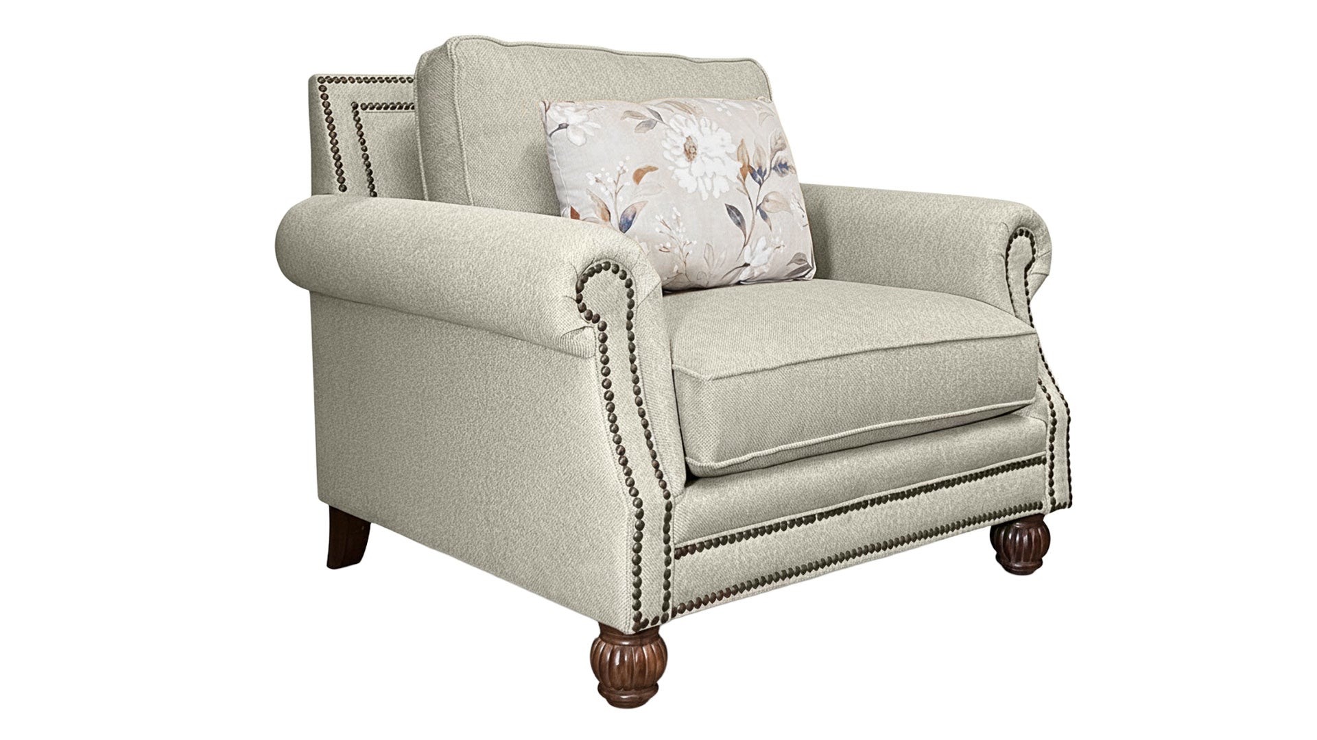 Beige armchair with a floral pillow on a white background