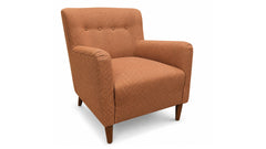 An upholstered armchair with a warm rust-orange fabric covered in a small repeating geometric pattern, featuring a high back with three button tufts, rolled arms, and tapered dark wood legs, shown on a plain white background.