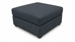 A square upholstered ottoman with a lift-top design, shown from a three-quarter angle on a white background.