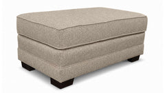 Beige ottoman with a textured surface on a white background