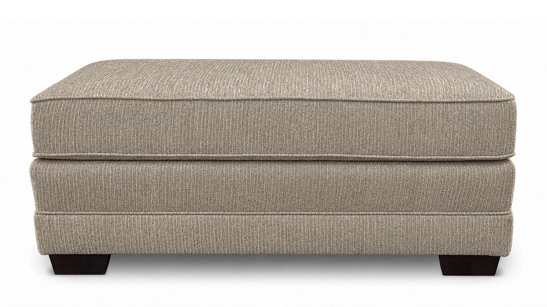 Beige ottoman with a textured surface on a white background