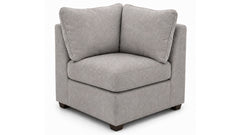 A light gray upholstered armchair with two back cushions, a thick seat cushion, and dark wooden feet, shown against a plain white background.