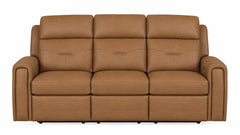 A three-seat power reclining sofa upholstered in tan leather, shown from a front-facing perspective against a solid white background.