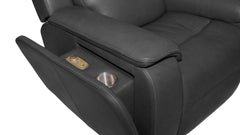 Close-up of a dark gray leather recliner chair showing the extended footrest with a small control panel and a cup holder, on a white background.
