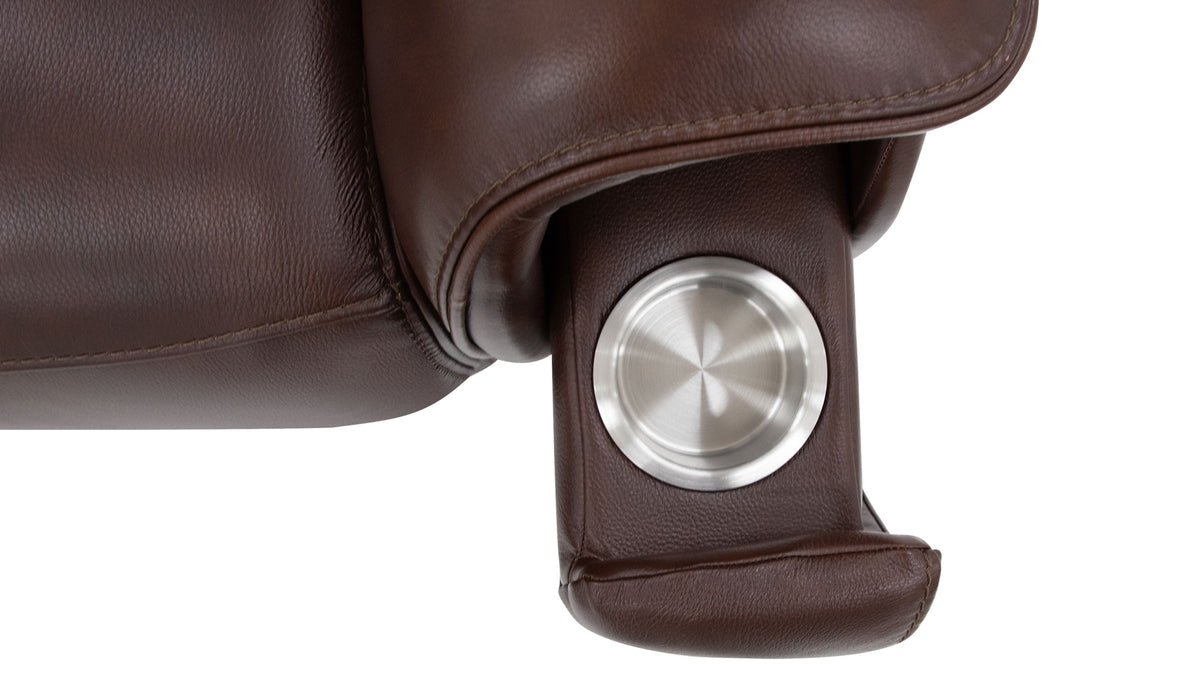 Close-up of a dark brown leather recliner armrest with a circular brushed stainless steel control knob on a white background.