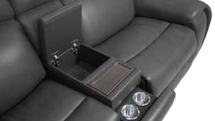 A dark gray leather reclining sofa with an open center armrest console showing a storage compartment and cup holders, photographed on a white background.