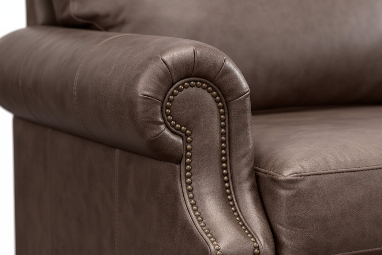Brown leather armchair on a white background