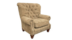 Beige armchair with tufted backrest and nailhead trim on a white background