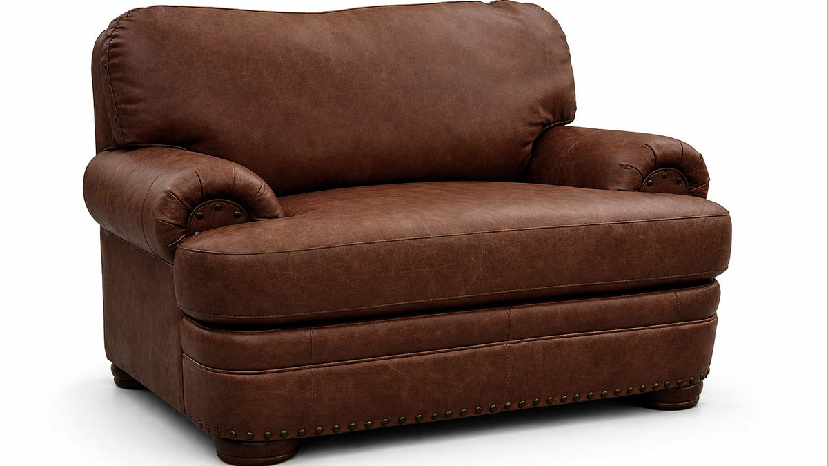 Brown leather armchair on a white background