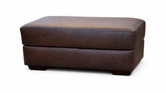 Brown leather ottoman on a white background