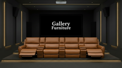 Brown leather sofa in a dark room with 'Gallery Furniture' branding.