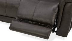 Close-up of a black leather recliner sofa on a white background