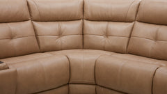Close-up of a beige leather sectional sofa
