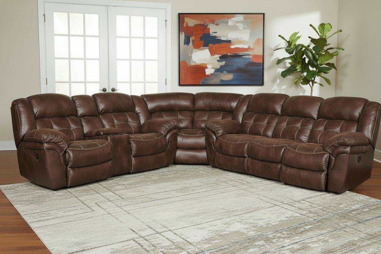 Brown leather sectional sofa in a living room setting with a painting and plant in the background.