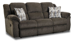 A brown, double reclining sofa with plush, pad-over chaise seating and solid foam arm pads, accompanied by two accent pillows with a geometric pattern.