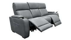 A gray leather reclining sofa with two extended footrests, shown on a plain white background.