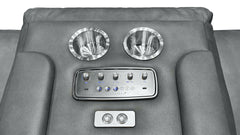 Close-up of a gray leather recliner backrest with two metallic cup holders, a central control panel, and a smaller lower control panel.