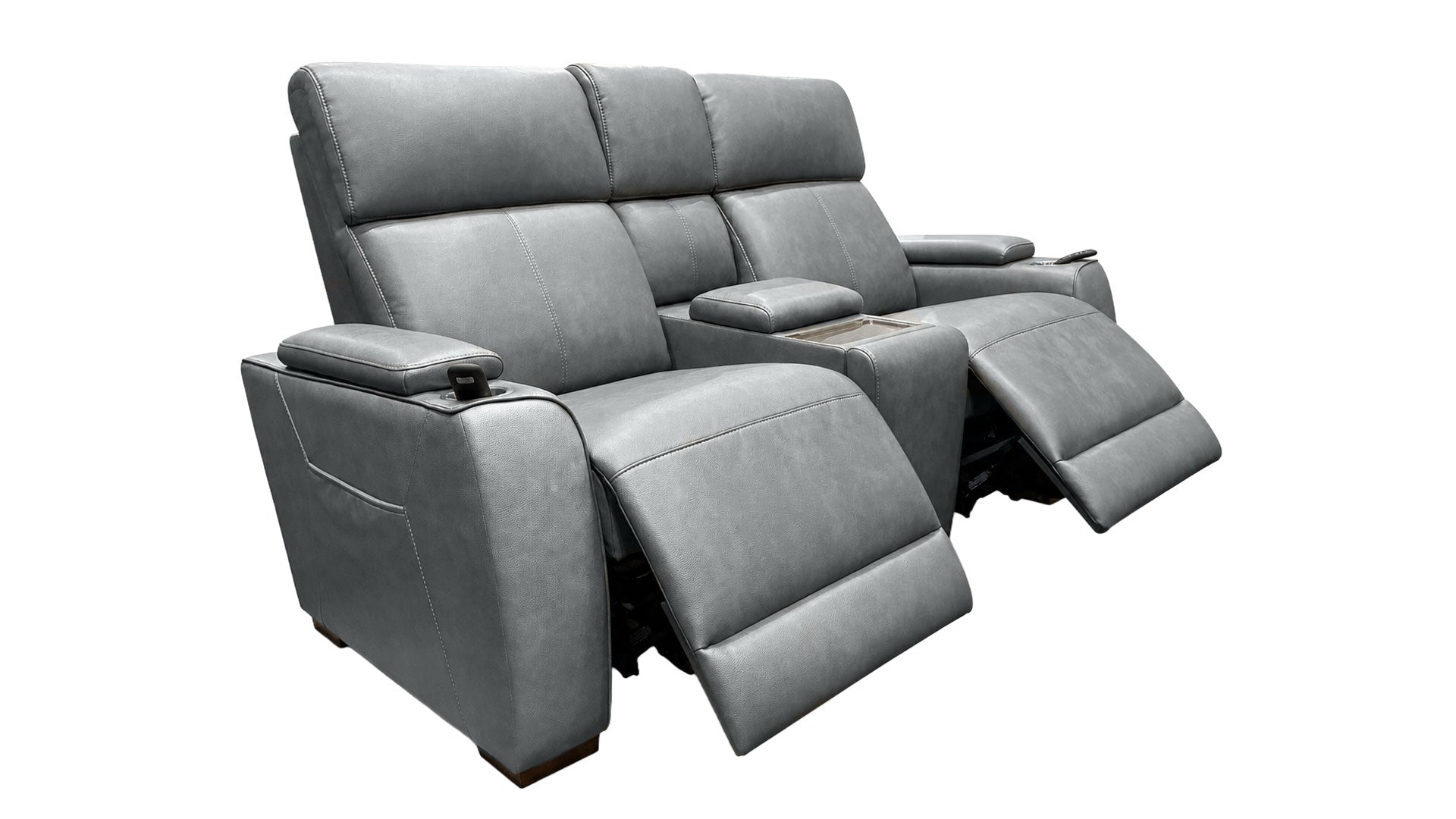 A gray upholstered reclining home theater sofa with two extended footrests and a center console, shown on a plain white background.