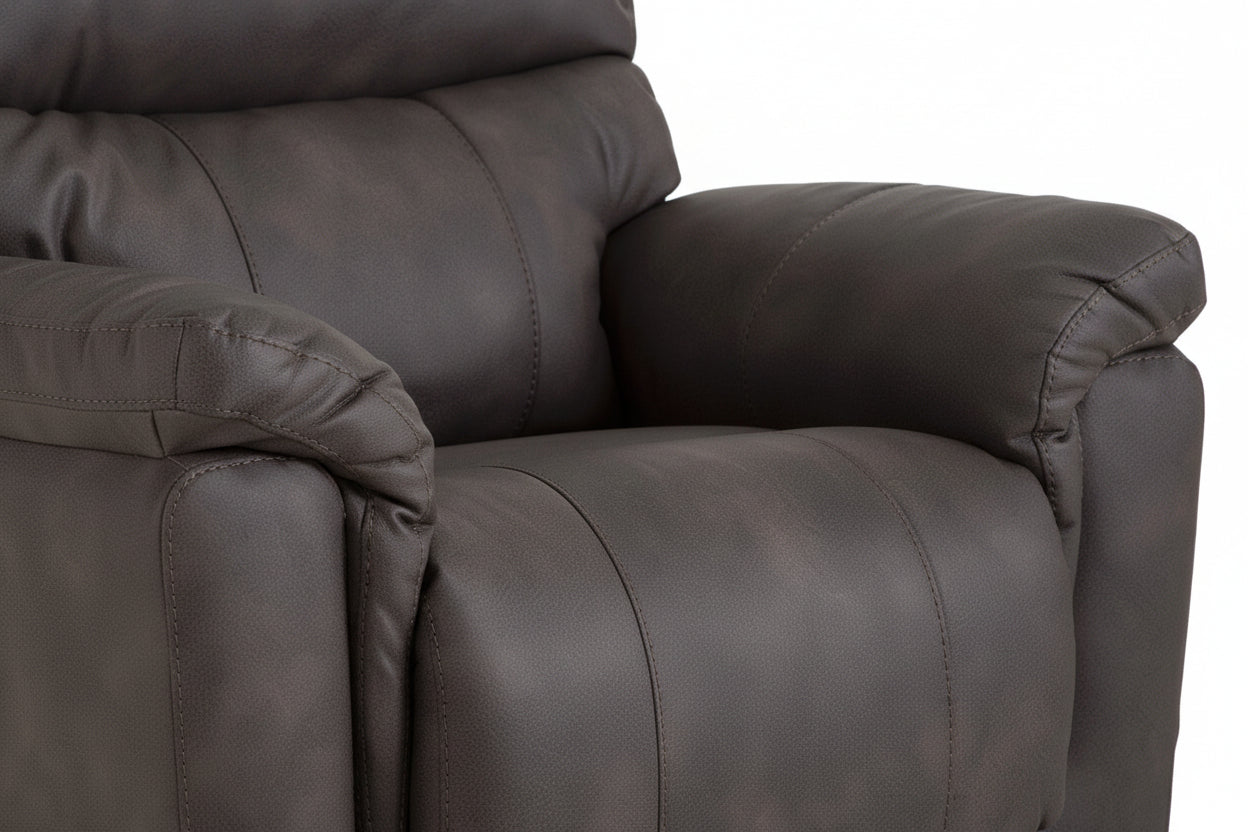 Sillón reclinable gris sobre fondo blanco