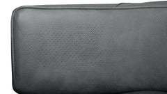 Close-up of a dark gray pebbled leather or faux leather surface with a subtle circular perforation pattern in the center, on a white background.