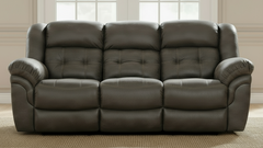 Brown leather sofa in a living room setting