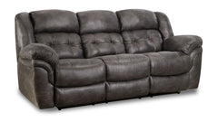 A gray microfiber power reclining sofa with a three-cushion backrest and padded armrests.