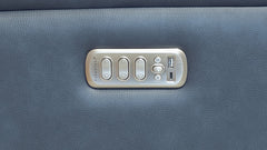 Control panel on a blue leather surface