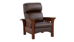 A brown Stickley Bustle Back Bow Arm Morris Recliner with a high backrest and armrests, made of wood and upholstered in leather.