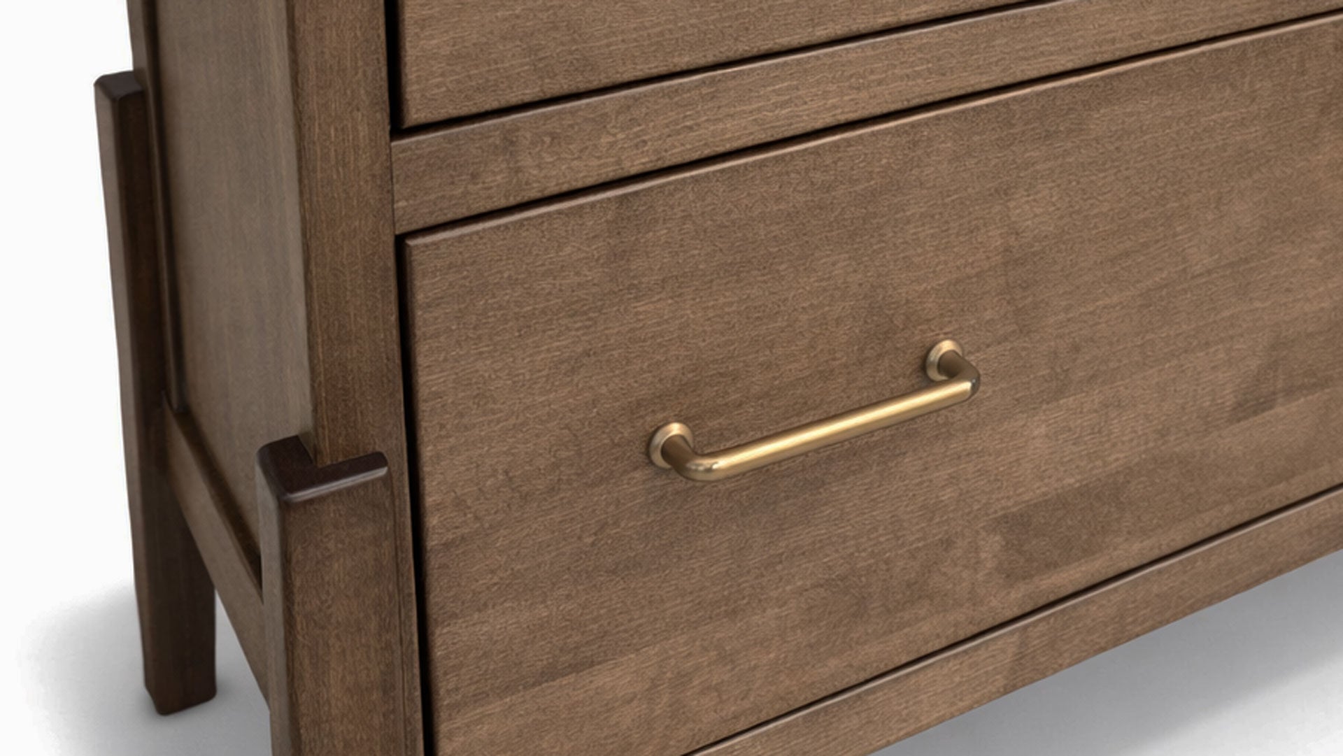 Cómoda de madera con tirador dorado sobre fondo blanco.