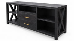 A modern black wood media console with two drawers featuring gold handles, open shelving on both sides, and X-shaped decorative side supports, shown on a white background.