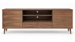 A mid-century modern wooden TV stand or media console with a warm walnut finish, featuring two cabinet doors, two open shelves, two drawers, and tapered legs, shown against a plain white background.