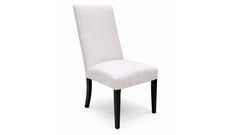 White upholstered chair with black legs on a white background