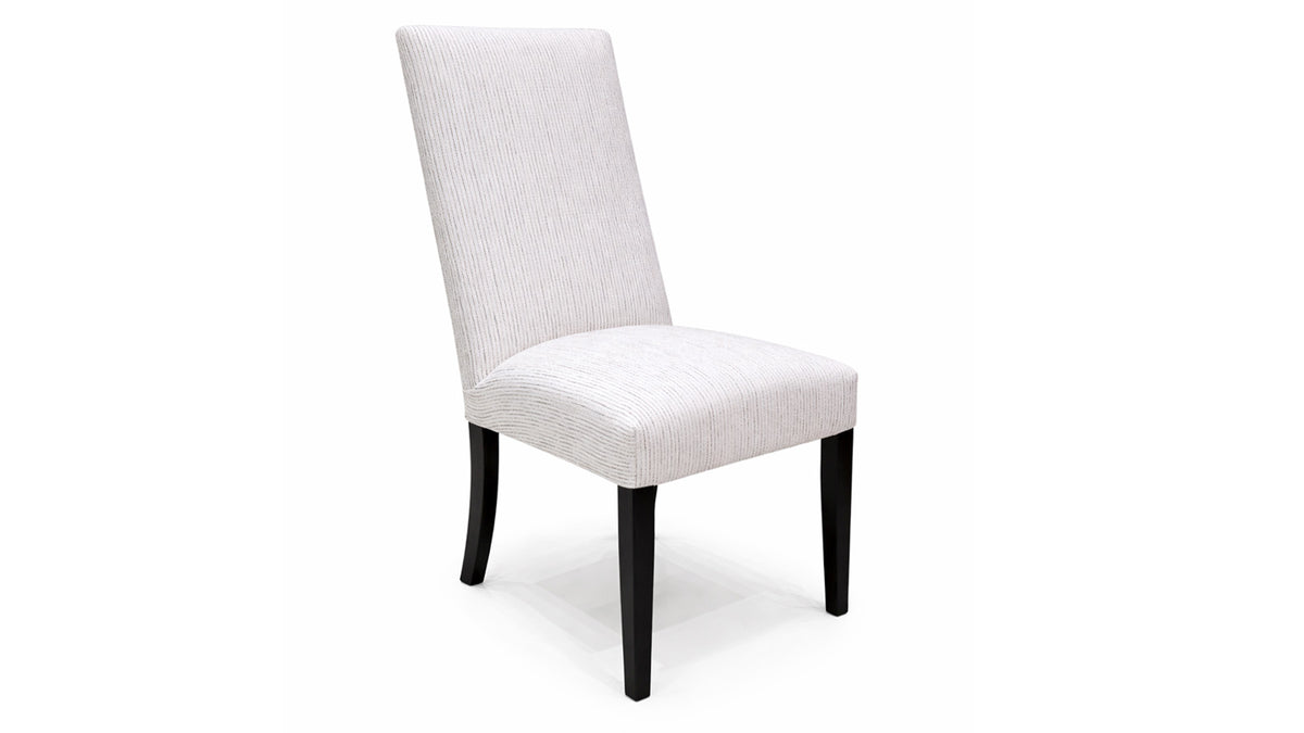 White upholstered chair with black legs on a white background