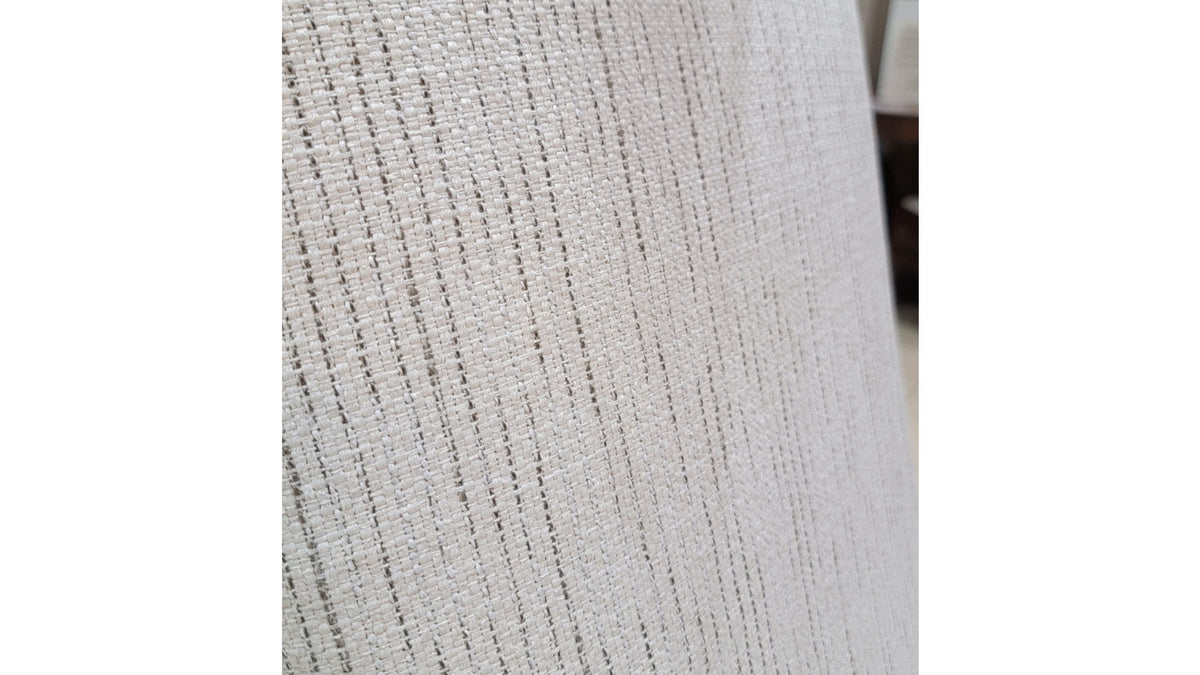 Close-up of textured gray fabric on a white background