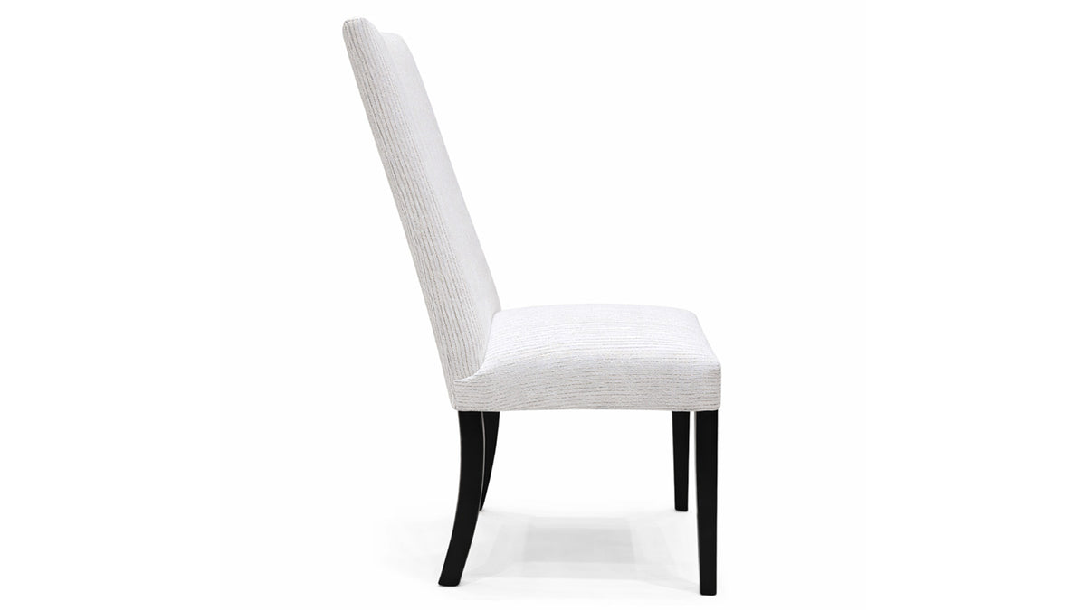 White chair with black legs on a white background